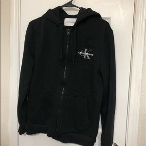Calvin Klein jacket black color with hoodie